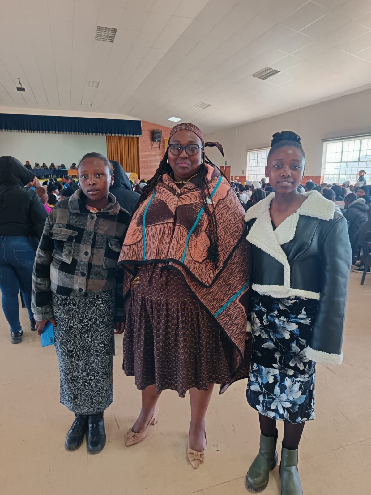 Matshidiso Sekonyela in the middle with her daughters Mangaka on her right and Maleshwane on her left grade 9 and 10 learners at Tesbo SS respectively.