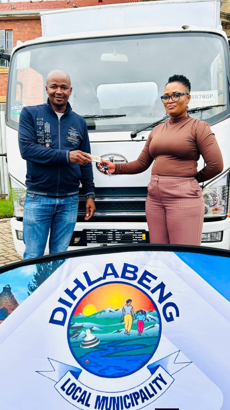 Dihlabeng executive mayor Tseki Tseki alongside Dihlabeng director of technical services Lungile Mokoteli during fleet handover.
