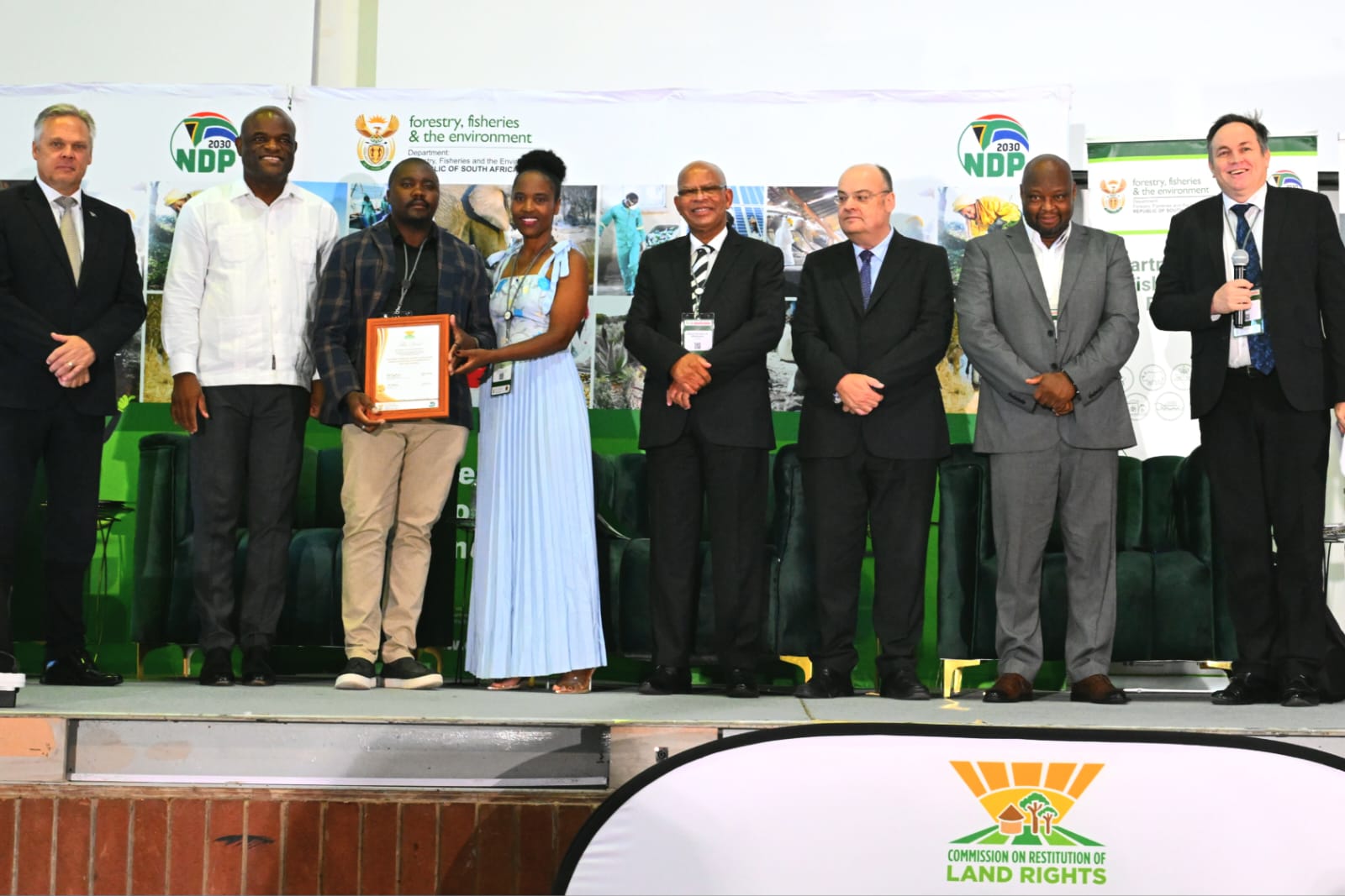 Deputy Minister in the Department of Land Reform & Rural Development Hon. Chupu Stanley Mathabatha accompanied by Minister of the Department of Forestry, Fisheries and the Environment Hon Willie Aucamp, Premier of the Northern Cape Province Dr Zamani Saul, members of the Dithabeng CPA and dignitaries from Northern Cape legislature, Deputy Land Claims Commissioner Mr Francois Beukman, and acting Director General Mr Clinton Heimann.