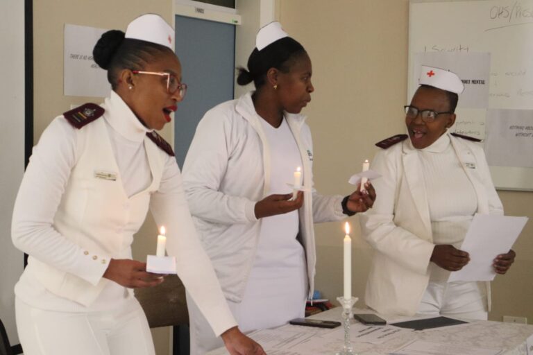Elizabeth Ross nurses lit candles on World nurses day as they said the nurses pledge.