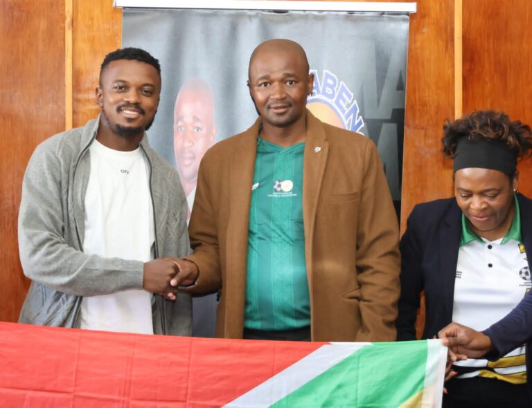 Bafana Bafana star Teboho Mokoena shaking hands with Dihlabeng Executive mayor Tseki Tseki alongside Thabo Mofutsanyana District regional SAFA president Mahlapi de Koker