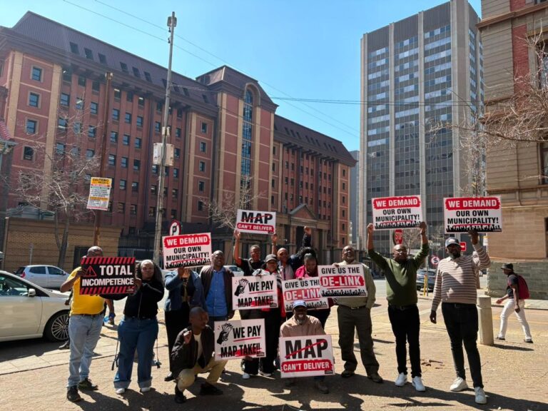 NGHA members with placards outside the North Gauteng high court