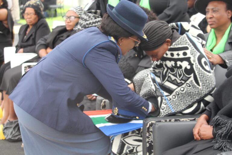 Lieutenant General Puleng Dimpane, comforts Nthabeleng Semenyane wife of late Sergeant PHOTO supplied SAPS