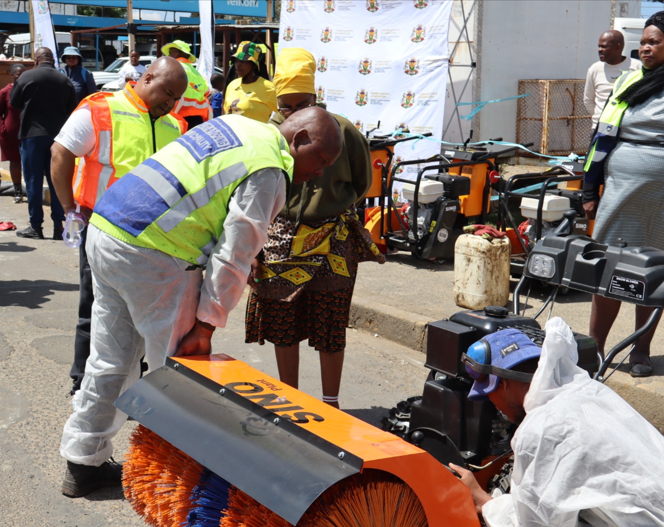 Mechanical broom being delivered by FS MEC of Cogta Saki Mokoena for MAP workers