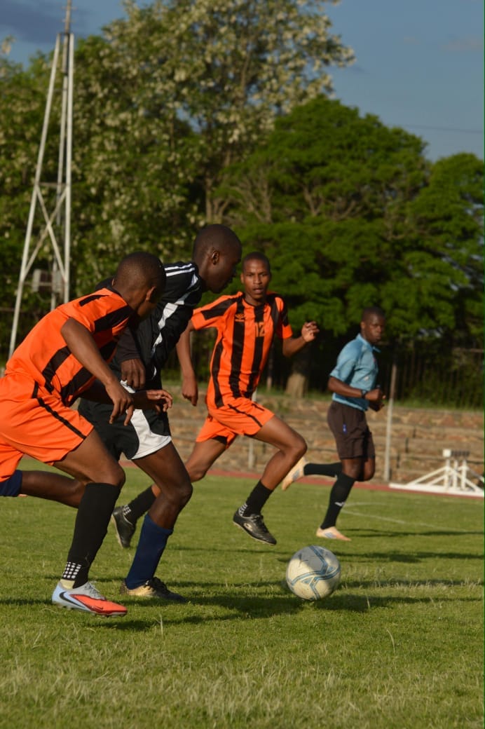 In Photo (supplied by Lefa Seleke): Finals of Nedbank Cup Qualifiers between Mautse United (black) and Young Flames FC (orange).