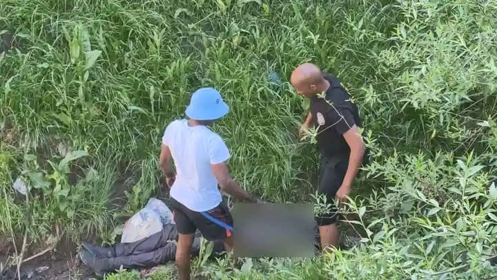 Rescue team rescuing Thabo Sediadia Photo SAPS